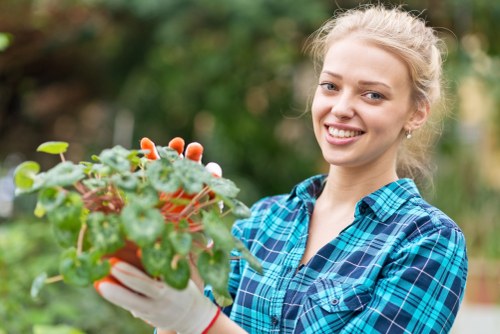 Technician assessing garden beds during inspection